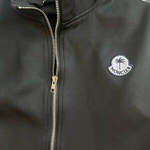 Moncler Black Suit with Sleek Design